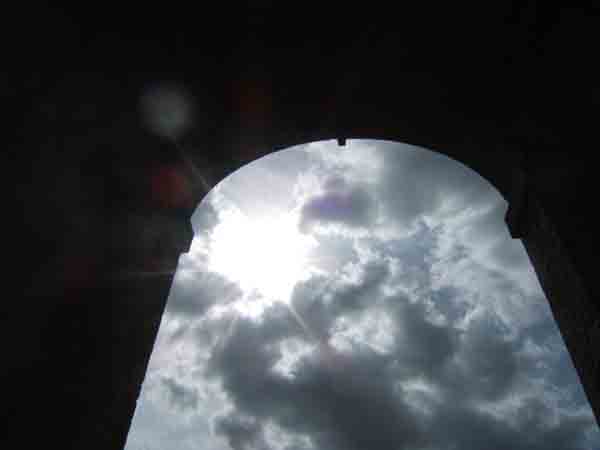 Sun breaking through clouds